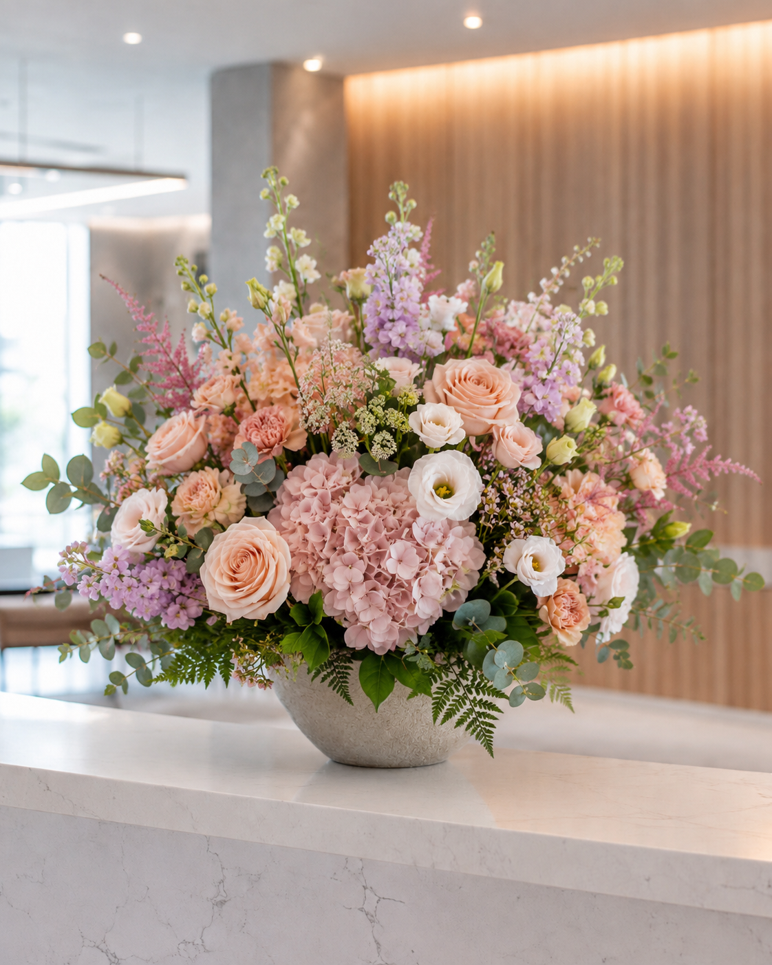 White and green office reception flower arrangement with seasonal flowers and vase for a professional business space in Denmark