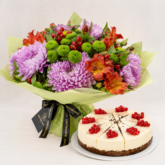 Farverig sæsonbuket med cheesecake | Blomster & kage levering