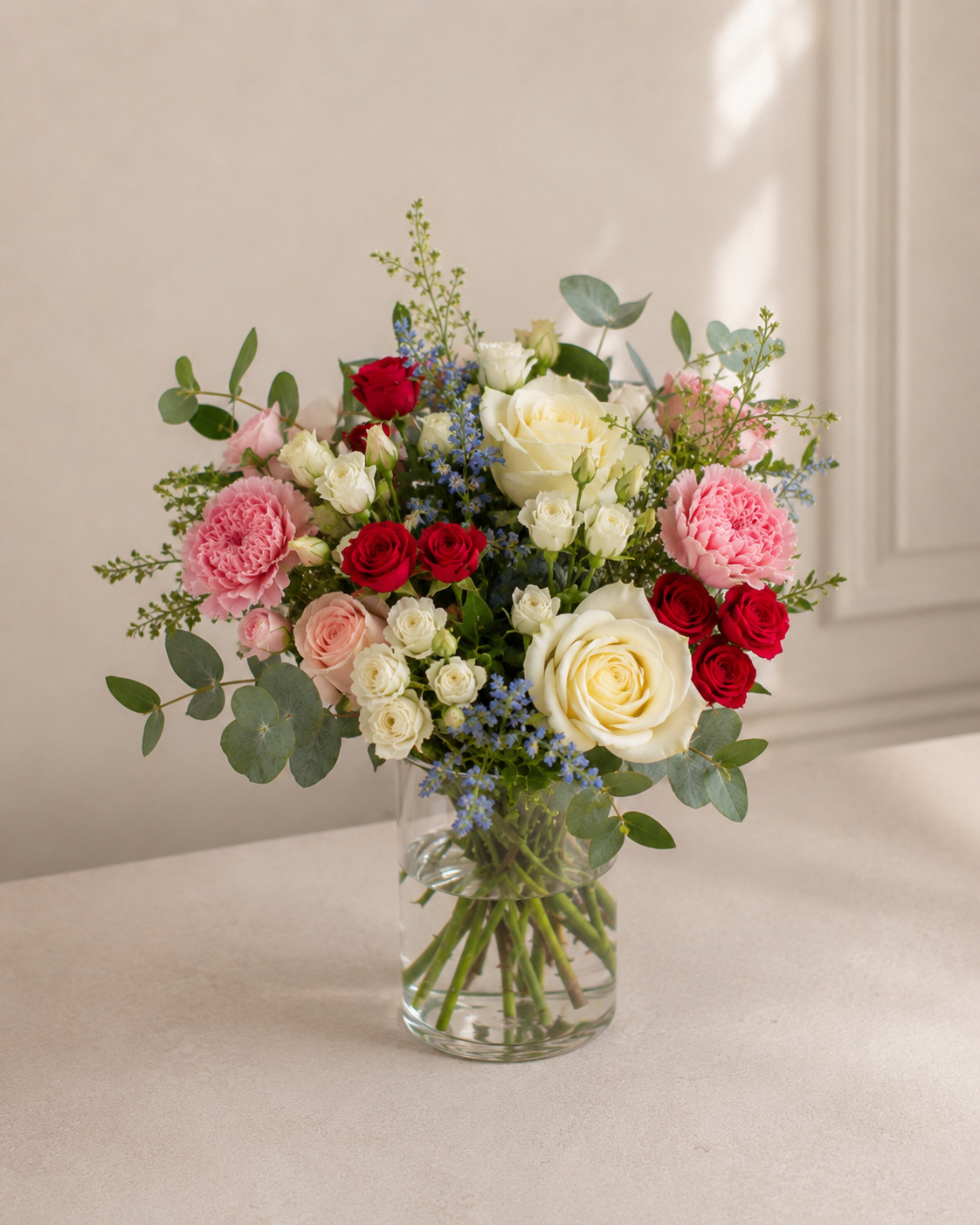 Soft Meadow Bouquet with fresh seasonal flowers in soft pink, cream and green tones