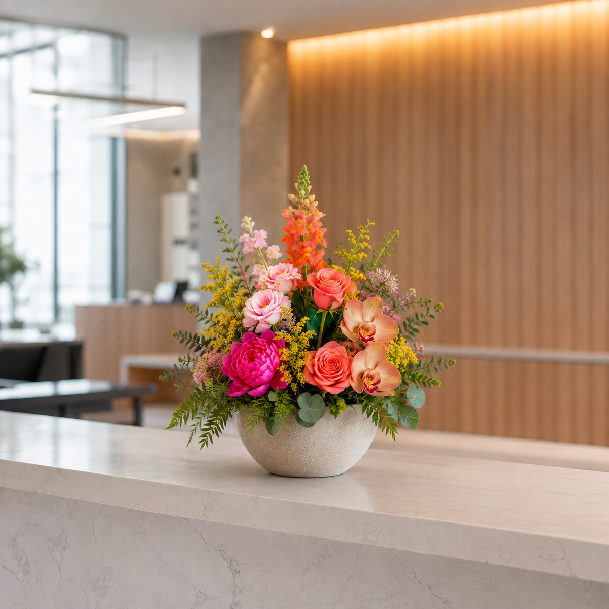 Luxury reception flower arrangement with premium seasonal flowers and an elegant vase for a professional business space in Denmark